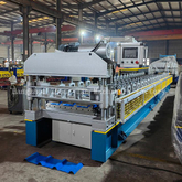 Roof and wall panel roll forming machine with electric cutting