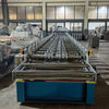 Roof and wall panel roll forming machine with electric cutting